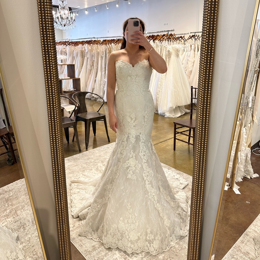 Ivory size 10 with a very detailed train